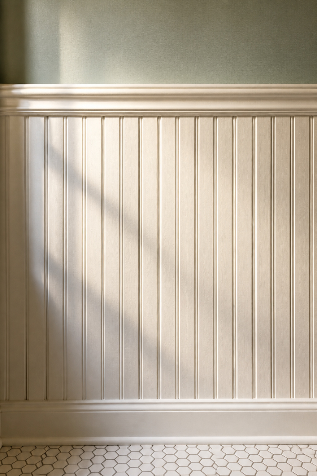 White painted beadboard wainscoting with cap rail moulding at 48 inches in a Victorian period bathroom