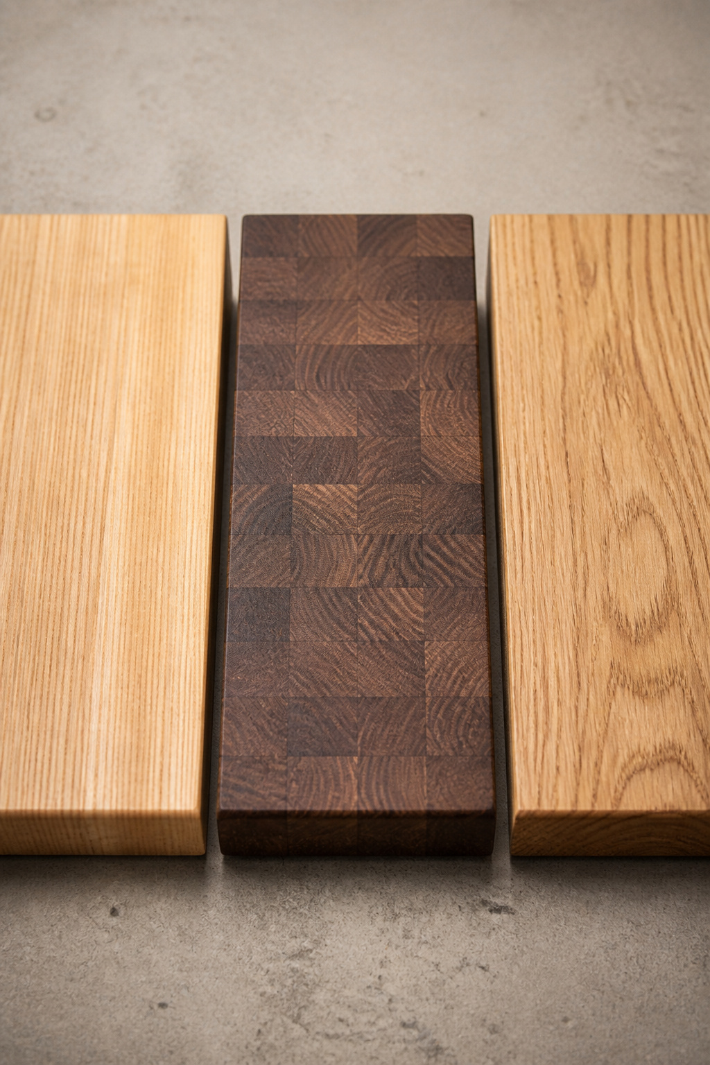 Three butcher block grain types side by side — edge grain maple, end grain walnut, face grain oak