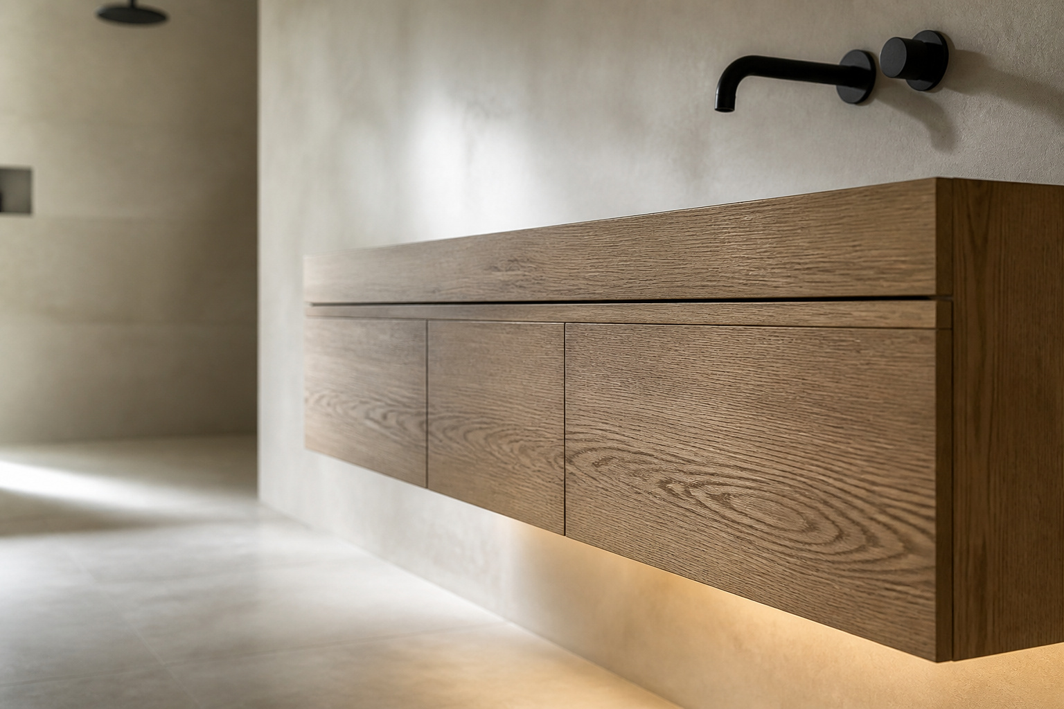 Warm oak floating bathroom vanity mounted on a bone-plaster wall with open floor space beneath it
